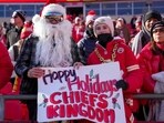 Kansas City Chiefs fans pose for a picture prior to a game against the Houston Texans at GEHA Field at Arrowhead Stadium on December 21, 2024 in Kansas City. Kansas City Chiefs fans pose for a picture prior to a game against the Houston Texans at GEHA Field at Arrowhead Stadium on December 21, 2024 in Kansas City.