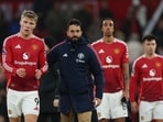 Manchester United's Rasmus Hojlund and Manchester United manager Ruben Amorim look dejected after the match.