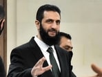 Syria's new leader Ahmed al-Sharaa (C) arrives for a meeing with visiting Druze officials from Lebanon's Progressive Socialist Party (PSP) in Damascus on December 22, 2024. Syria's new leader Ahmed al-Sharaa (C) arrives for a meeing with visiting Druze officials from Lebanon's Progressive Socialist Party (PSP) in Damascus on December 22, 2024.