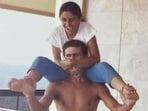 An undated personal photo of ousted Syrian President Bashar Assad with an unidentified woman in an unknown location. AP cannot verify the source of photos of the ousted leader that have surfaced from his abandoned residences.
