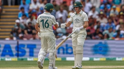 Nathan McSweeney fist bumps with batting partner Marnus Labuschagne. (AP) Nathan McSweeney fist bumps with batting partner Marnus Labuschagne. (AP)