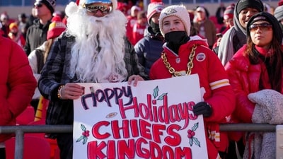 Kansas City Chiefs fans pose for a picture prior to a game against the Houston Texans at GEHA Field at Arrowhead Stadium on December 21, 2024 in Kansas City. (Getty Images via AFP)