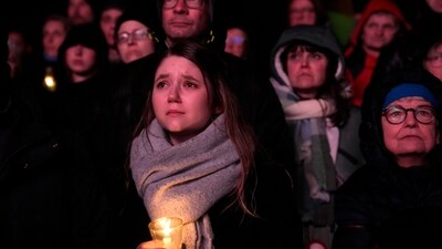 People outside Magdeburg Cathedral follow a memorial service for victims of Friday's Christmas Market attack, where a car drove into a crowd, in Magdeburg, Germany, (AP) People outside Magdeburg Cathedral follow a memorial service for victims of Friday's Christmas Market attack, where a car drove into a crowd, in Magdeburg, Germany, (AP)
