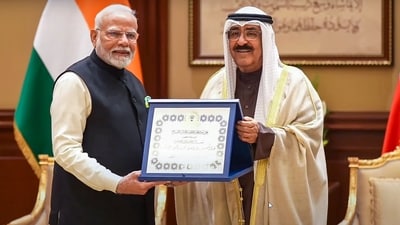Prime Minister Narendra Modi being conferred with Kuwait's highest honour 'The Order of Mubarak Al Kabeer' by Amir of Kuwait Sheikh Meshal Al-Ahmad Al-Jaber Al Sabah, in Kuwait. (PTI) Prime Minister Narendra Modi being conferred with Kuwait's highest honour 'The Order of Mubarak Al Kabeer' by Amir of Kuwait Sheikh Meshal Al-Ahmad Al-Jaber Al Sabah, in Kuwait. (PTI)