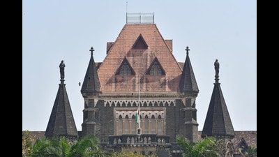 Mumbai, India - February 07, 2022: The Indian National flag flies half-mast on Bombay High Court building as a mark of respect to Lata Mangeshkar during the two-day national mourning being observed after she died on Sunday morning, in Mumbai, India, on Monday, February 07, 2021. (Photo by Bhushan Koyande/ HT Photo) (HT PHOTO) Mumbai, India - February 07, 2022: The Indian National flag flies half-mast on Bombay High Court building as a mark of respect to Lata Mangeshkar during the two-day national mourning being observed after she died on Sunday morning, in Mumbai, India, on Monday, February 07, 2021. (Photo by Bhushan Koyande/ HT Photo) (HT PHOTO)