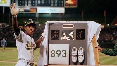 FILE - Rickey Henderson waves to the crowd during a presentation after he stole third base against the Toronto Blue Jays in the seventh inning to break Ty Cobb's career stolen base record, at Oakland Coliseum in Oakland, Calif., May 30, 1990. (AP Photo/Paul Sakuma, File) (AP) FILE - Rickey Henderson waves to the crowd during a presentation after he stole third base against the Toronto Blue Jays in the seventh inning to break Ty Cobb's career stolen base record, at Oakland Coliseum in Oakland, Calif., May 30, 1990. (AP Photo/Paul Sakuma, File) (AP)