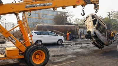 Rescue operation underway after an LPG tanker collided with multiple vehicles on the Jaipur-Ajmer highway, in Jaipur on Friday. (PTI) Rescue operation underway after an LPG tanker collided with multiple vehicles on the Jaipur-Ajmer highway, in Jaipur on Friday. (PTI)