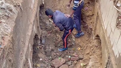 Workers during excavation work at a site at Chandausi area, in Sambhal. (PTI) Workers during excavation work at a site at Chandausi area, in Sambhal. (PTI)