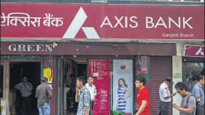 People walk past a branch of Axis Bank Ltd. on Mahatma Gandhi Road in Gangtok, India, on Tuesday, May 3, 2016. Year-on-year growth in Asia's third-largest economy accelerated in the first three months of 2016 to 7.9 percent. Photographer: Prashanth Vishwanathan/Bloomberg (Bloomberg) People walk past a branch of Axis Bank Ltd. on Mahatma Gandhi Road in Gangtok, India, on Tuesday, May 3, 2016. Year-on-year growth in Asia's third-largest economy accelerated in the first three months of 2016 to 7.9 percent. Photographer: Prashanth Vishwanathan/Bloomberg (Bloomberg)