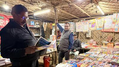 The roadside shop is crammed with all the English and Hindi dailies that pour into Delhi afresh every morning. (HT Photo) The roadside shop is crammed with all the English and Hindi dailies that pour into Delhi afresh every morning. (HT Photo)