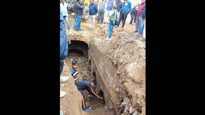 Workers during excavation work at a site at Chandausi area, in Sambhal district on Sunday. (PTI) Workers during excavation work at a site at Chandausi area, in Sambhal district on Sunday. (PTI)
