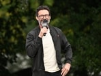 Amidst the holiday season, Hugh Jackman is trying to balance his new relationship with Sutton Foster and his children's feelings, following his separation from Deborra-Lee Furness. (Photo by Evan Agostini/Invision/AP) Amidst the holiday season, Hugh Jackman is trying to balance his new relationship with Sutton Foster and his children's feelings, following his separation from Deborra-Lee Furness. (Photo by Evan Agostini/Invision/AP)