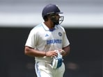 India's Rohit Sharma walks off the field after his dismissal by Australia's bowler Pat Cummins India's Rohit Sharma walks off the field after his dismissal by Australia's bowler Pat Cummins
