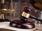 The slipper however did not hit the judge and instead hit a wooden frame in front of his desk. The slipper however did not hit the judge and instead hit a wooden frame in front of his desk.