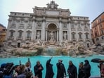 Trevi Fountain reopens with visitor limit of 400 amid three-month clean-up.(AP Photo)