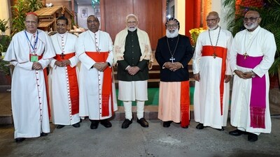 Prime Minister Narendra Modi poses for a group picture with Archbishops, Bishops and CBCI members during the Christmas celebrations hosted by the Catholic Bishops' Conference of India (CBCI). (DPR PMO)