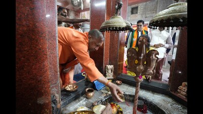 Chief minister Yogi Adityanath worshipping in the Shiva temple at Dashashwamedh Ghat, near Sangam ahead of Mahakumbh festival in Prayagraj. (AP) Chief minister Yogi Adityanath worshipping in the Shiva temple at Dashashwamedh Ghat, near Sangam ahead of Mahakumbh festival in Prayagraj. (AP)