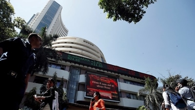 Sensex, Nifty 50 today: People walk past the Bombay Stock Exchange (BSE) building in Mumbai, India, March 9, 2020 (Francis Mascarenhas/Reuters) Sensex, Nifty 50 today: People walk past the Bombay Stock Exchange (BSE) building in Mumbai, India, March 9, 2020 (Francis Mascarenhas/Reuters)