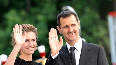 (FILES) Syrian President Bashar al-Assad and his wife Asma arrive for a dinner at the Petit Palais, after attending Paris' Union for the Mediterranean founding summit on July 13, 2008 in Paris. (Photo by Gerard CERLES / AFP) (FILES) Syrian President Bashar al-Assad and his wife Asma arrive for a dinner at the Petit Palais, after attending Paris' Union for the Mediterranean founding summit on July 13, 2008 in Paris. (Photo by Gerard CERLES / AFP)