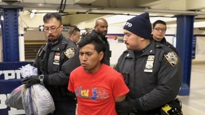 NYPD apprehends suspect after deadly subway attack; community rallies for justice. (Mario Nawfal) NYPD apprehends suspect after deadly subway attack; community rallies for justice. (Mario Nawfal)