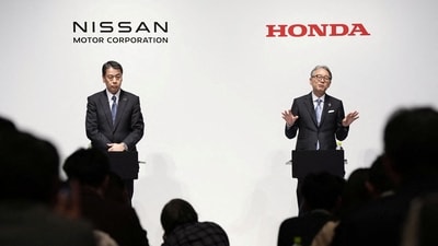 Makoto Uchida, president and CEO of Nissan Motor, and Toshihiro Mibe, Honda Motor president and CEO, attend their joint press conference in Tokyo, Japan March 15, 2024 (Kyodo via Reuters)