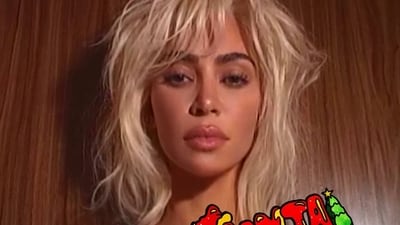 Kim Kardashian released a quirky cover of 'Santa Baby,' produced by Travis Barker, featuring a bizarre music video. (@KimKardashian/X) Kim Kardashian released a quirky cover of 'Santa Baby,' produced by Travis Barker, featuring a bizarre music video. (@KimKardashian/X)