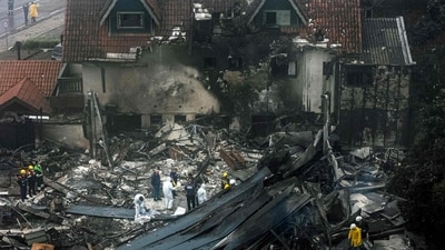 Firefighters and other rescue teams work in the site of a plane crash at the city of Gramado, Rio Grande do Sul state, Brazil, on December 22, 2024. (AFP) Firefighters and other rescue teams work in the site of a plane crash at the city of Gramado, Rio Grande do Sul state, Brazil, on December 22, 2024. (AFP)