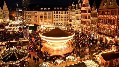 People visit just opening Christmas fair at the central Roemer Square in Frankfurt am Main, western Germany. (AFP) People visit just opening Christmas fair at the central Roemer Square in Frankfurt am Main, western Germany. (AFP)
