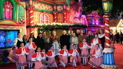 Princess Charlene of Monaco (C) flanked by Monaco mayor Georges Marsan (CR), stands next to her children Princess Gabriella (CR) and Prince's Jacques of Monaco (CL) as they attend the inauguration of the Christmas village in Monaco. (AFP) Princess Charlene of Monaco (C) flanked by Monaco mayor Georges Marsan (CR), stands next to her children Princess Gabriella (CR) and Prince's Jacques of Monaco (CL) as they attend the inauguration of the Christmas village in Monaco. (AFP)