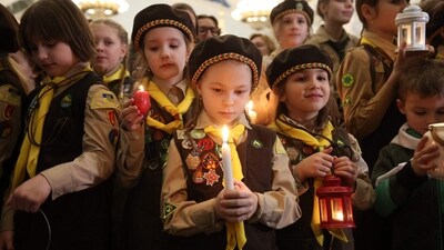 Scouts of the 'Plast' National Scout Organization of Ukraine hold the Bethlehem flame of peace at the railway station in Kyiv amid the Russian invasion in Ukraine. The Ukrainian scouts received the Bethlehem flame of peace from the scouts of Austria and will pass it to residents of all regions of Ukraine, including the de-occupied territories, along with Christmas presents for children. (AFP) Scouts of the 'Plast' National Scout Organization of Ukraine hold the Bethlehem flame of peace at the railway station in Kyiv amid the Russian invasion in Ukraine. The Ukrainian scouts received the Bethlehem flame of peace from the scouts of Austria and will pass it to residents of all regions of Ukraine, including the de-occupied territories, along with Christmas presents for children. (AFP)