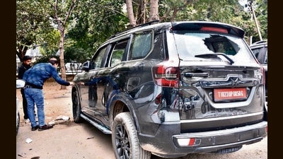 The victims’ bullet-riddled car at the crime spot -- the parking of Sultanat Hotel, 10 kilometres from Panchkula city. (SANT ARORA/HT) The victims’ bullet-riddled car at the crime spot -- the parking of Sultanat Hotel, 10 kilometres from Panchkula city. (SANT ARORA/HT)