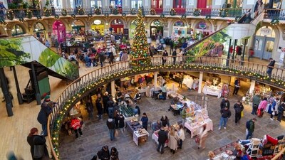 Shoppers in Leeds Corn Exchange in Leeds, UK. (Bloomberg) Shoppers in Leeds Corn Exchange in Leeds, UK. (Bloomberg)