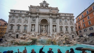 Trevi Fountain reopens with visitor limit of 400 amid three-month clean-up. (AP Photo) Trevi Fountain reopens with visitor limit of 400 amid three-month clean-up. (AP Photo)