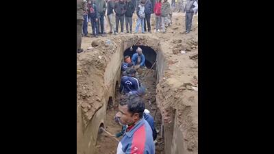 Workers at the site after an ancient well closed for a long time with clean water was discovered in Sambhal, Monday. (PTI Photo) Workers at the site after an ancient well closed for a long time with clean water was discovered in Sambhal, Monday. (PTI Photo)