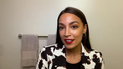 Alexandria Ocasio-Cortez declares "I'm not pregnant guys." (Vogue/YouTube Screen Grab)