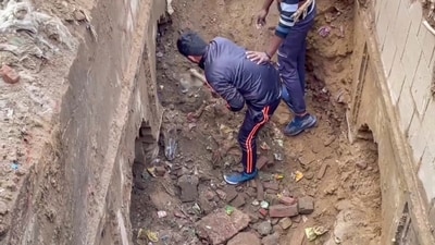 Workers during excavation work at a site at Chandausi area, in Sambhal district on Sunday. (PTI) Workers during excavation work at a site at Chandausi area, in Sambhal district on Sunday. (PTI)