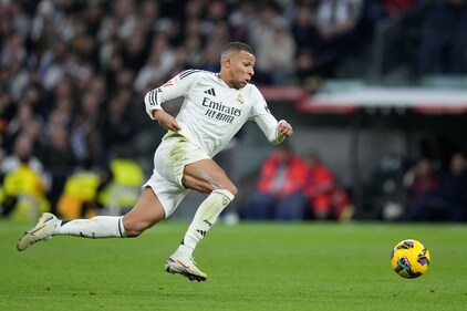 Real Madrid's Kylian Mbappe runs to the ball during a La Liga match. (AP) Real Madrid's Kylian Mbappe runs to the ball during a La Liga match. (AP)