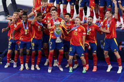 Spain's Alvaro Morata lifts the trophy after winning the final match against England at the Euro 2024 tournament in Berlin. (AP) Spain's Alvaro Morata lifts the trophy after winning the final match against England at the Euro 2024 tournament in Berlin. (AP)