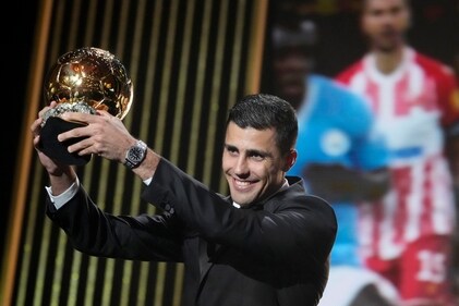 Rodri receives the 2024 Men's Ballon d'Or award. (AP) Rodri receives the 2024 Men's Ballon d'Or award. (AP)