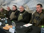 This handout picture released by the Government Press Office (GPO) shows Israeli prime minister Benjamin Netanyahu (C-R) and defence minister Israel Katz (C-L). This handout picture released by the Government Press Office (GPO) shows Israeli prime minister Benjamin Netanyahu (C-R) and defence minister Israel Katz (C-L).