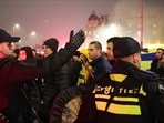 In this image taken from video, police escort Maccabi Tel Aviv supporters to the metro station leading them to the Ajax stadium, after pro-Palestinian supporters marched near the stadium, in Amsterdam In this image taken from video, police escort Maccabi Tel Aviv supporters to the metro station leading them to the Ajax stadium, after pro-Palestinian supporters marched near the stadium, in Amsterdam