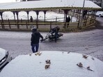 A biker falls on a slippery road after fresh snowfall in Shimla, Himachal Pradesh, A biker falls on a slippery road after fresh snowfall in Shimla, Himachal Pradesh,