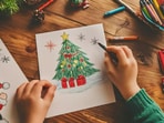Christmas 2024 brings joy and creativity for children, featuring festive activities like drawing and singing.(Freepik)