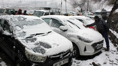 At Manali in Himachal Pradesh's Kullu district, a man was spotted clearing snow off his car after fresh snowfall on Tuesday. The meteorological department issued an 'orange' warning for extreme cold in Bilaspur, Una, Hamirpur, and Mandi and a 'yellow' warning for dense fog in parts of the Bhakra Dam area and Balh Valley in Mandi until Thursday. (ANI) At Manali in Himachal Pradesh's Kullu district, a man was spotted clearing snow off his car after fresh snowfall on Tuesday. The meteorological department issued an 'orange' warning for extreme cold in Bilaspur, Una, Hamirpur, and Mandi and a 'yellow' warning for dense fog in parts of the Bhakra Dam area and Balh Valley in Mandi until Thursday. (ANI)
