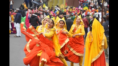 Artists performing traditional dance during winter carnival at Ridge in Shimla on Tuesday. (Deepak Sansta/HT) Artists performing traditional dance during winter carnival at Ridge in Shimla on Tuesday. (Deepak Sansta/HT)