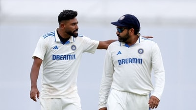 India's Mohammed Siraj (L) reacts with captain Rohit Sharma (AFP) India's Mohammed Siraj (L) reacts with captain Rohit Sharma (AFP)
