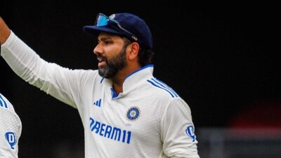 India's Rohit Sharma (R) gestures during day five of the third cricket Test match between Australia and India at The Gabba (AFP) India's Rohit Sharma (R) gestures during day five of the third cricket Test match between Australia and India at The Gabba (AFP)