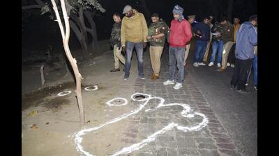 Chalk outline at the encounter site on Tuesday after police gunned down a criminal who allegedly broke into the lockers of a bank, in the Chinhat area of Lucknow on Sunday. (PTI Photo) Chalk outline at the encounter site on Tuesday after police gunned down a criminal who allegedly broke into the lockers of a bank, in the Chinhat area of Lucknow on Sunday. (PTI Photo)