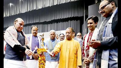 Defence minister Rajnath Singh and UP chief minister Yogi Adityanath light a ceremonial lamp during the ‘Atal Geet Ganga’ programme, in Lucknow on Tuesday. Deputy CMs Brajesh Pathak, Keshav Prasad Maurya and poet Kumar Vishwas are also seen. (ANI Photo)