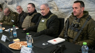 This handout picture released by the Government Press Office (GPO) shows Israeli prime minister Benjamin Netanyahu (C-R) and defence minister Israel Katz (C-L). (AFP file photo) This handout picture released by the Government Press Office (GPO) shows Israeli prime minister Benjamin Netanyahu (C-R) and defence minister Israel Katz (C-L). (AFP file photo)